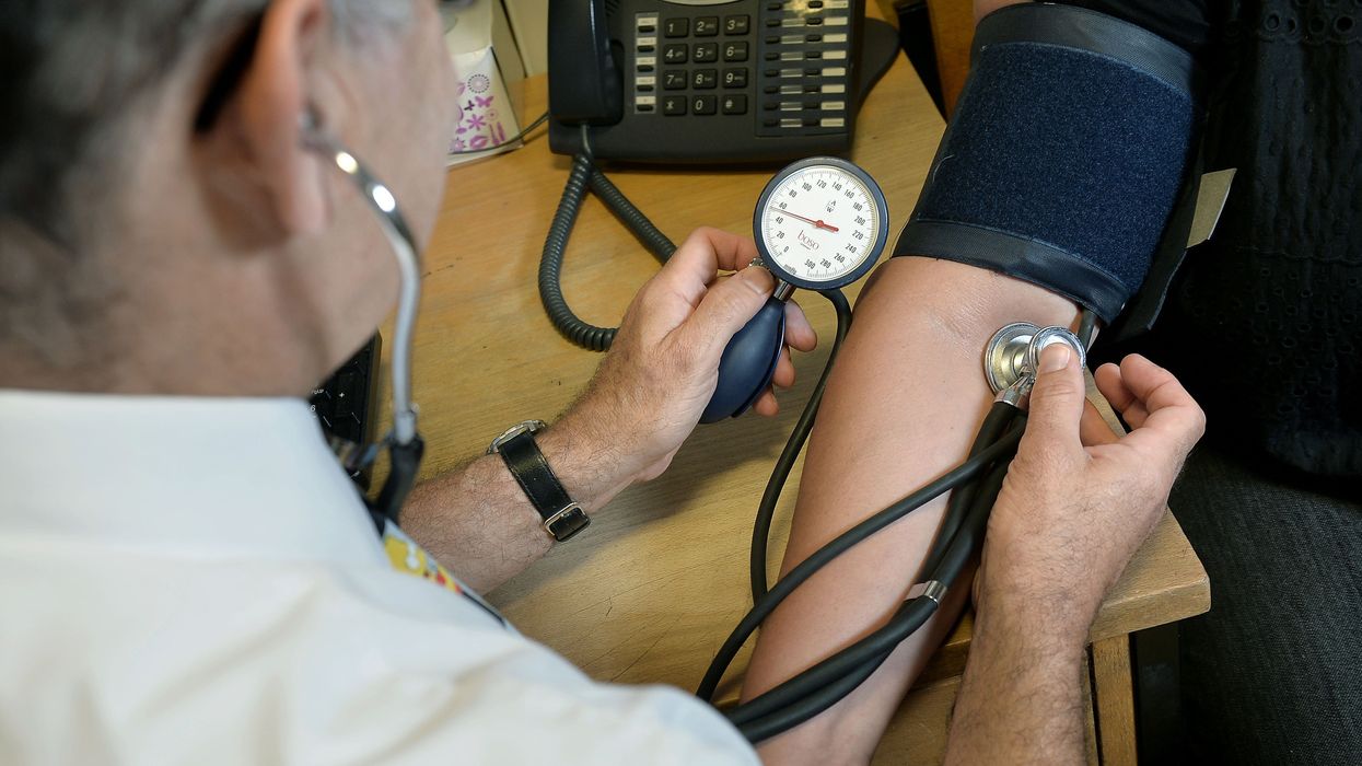 A doctor checks up on a patient