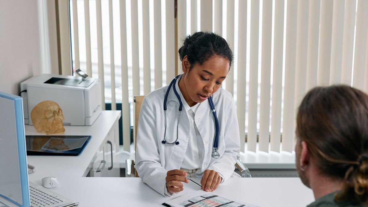 A doctor talking to a patient