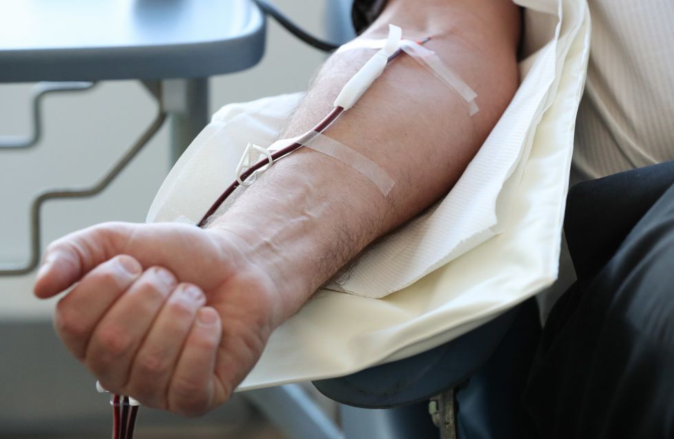 A donor giving blood