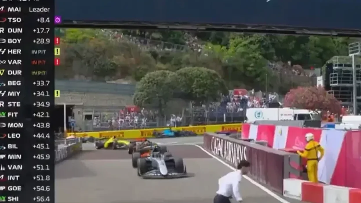 A dramatic moment unfolded during Sunday's Formula 2 race in Monaco when a track worker narrowly avoided being struck by an oncoming car after running across the circuit