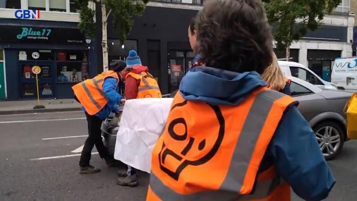 Just Stop Oil protester rammed by car as driver 'runs over her foot' after blocking road