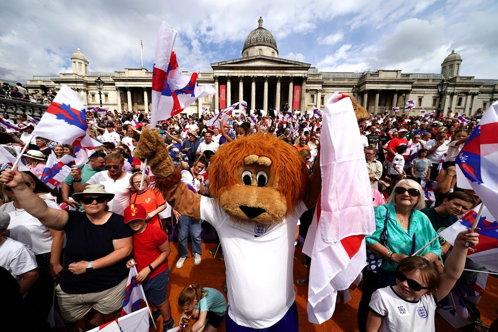A England fan dressed as a Lion during a fan celebration to commemorate England's historic UEFA Women's EURO 2022 triumph in Trafalgar Square, London. Picture date: Monday August 1, 2022.