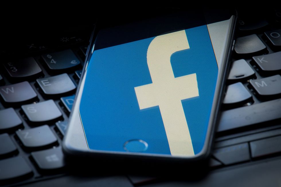A Facebook logo on a smartphone screen 