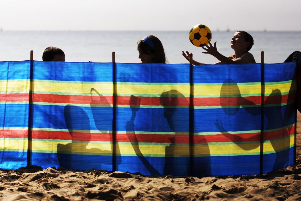 A family on a beach in Dorset