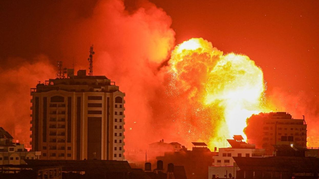 A fireball erupts from an Israeli airstrike in Gaza City