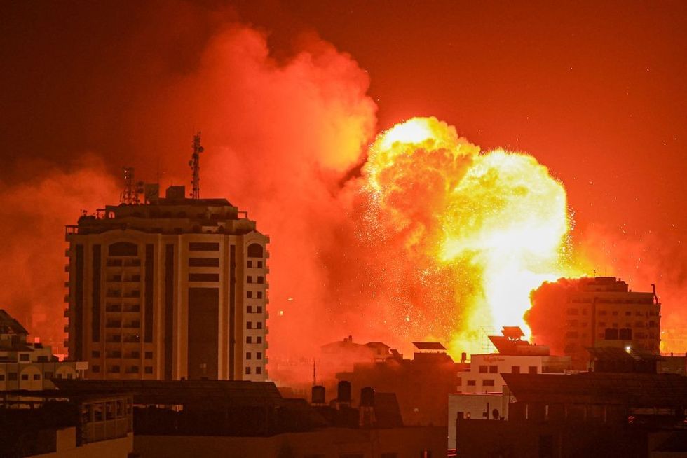 A fireball erupts from an Israeli airstrike in Gaza City