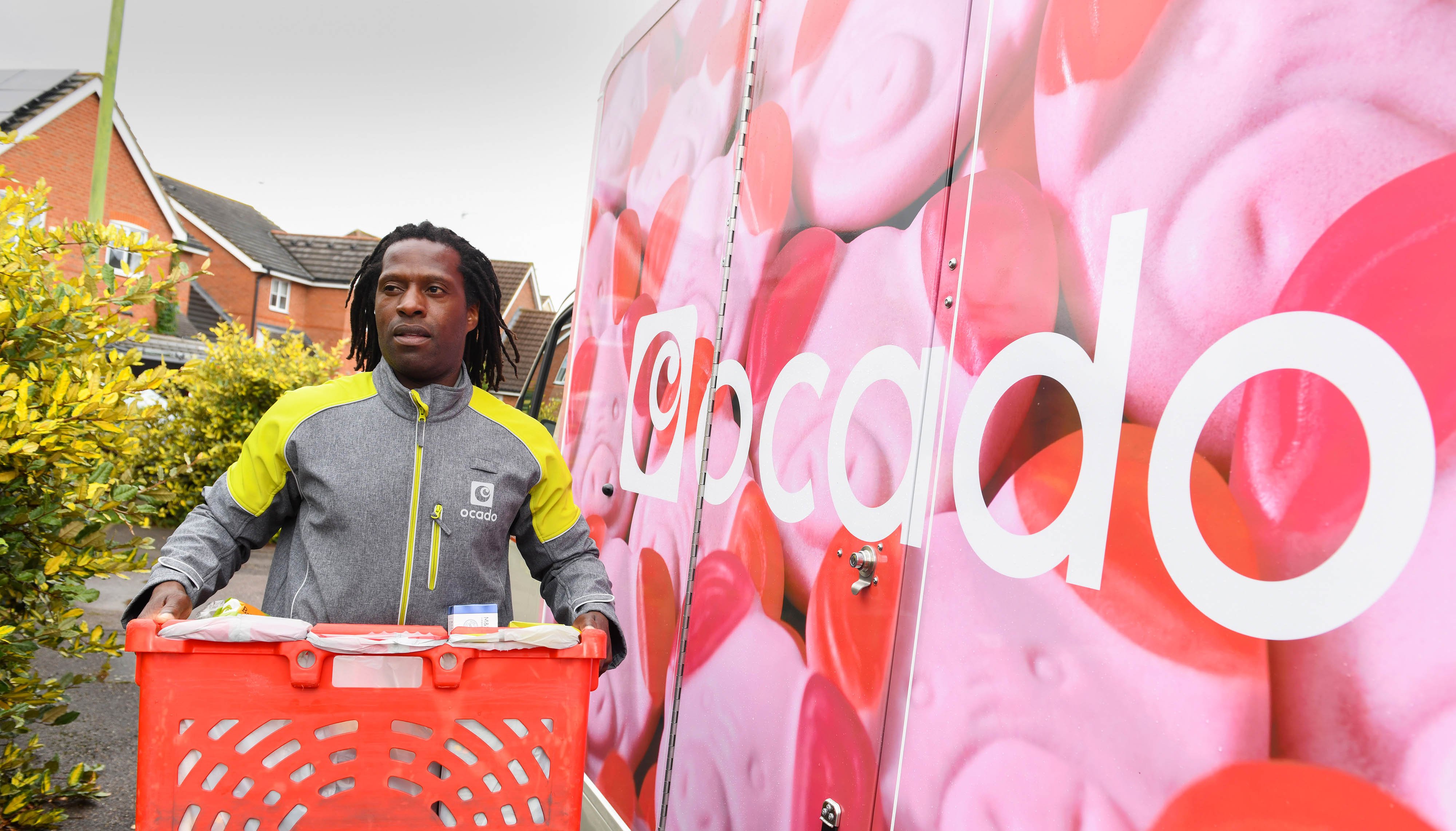 A fleet of limited-edition Percy Pig delivery vans are unveiled as Ocado marks the arrival of the full M&S Food range to the online supermarket's website.