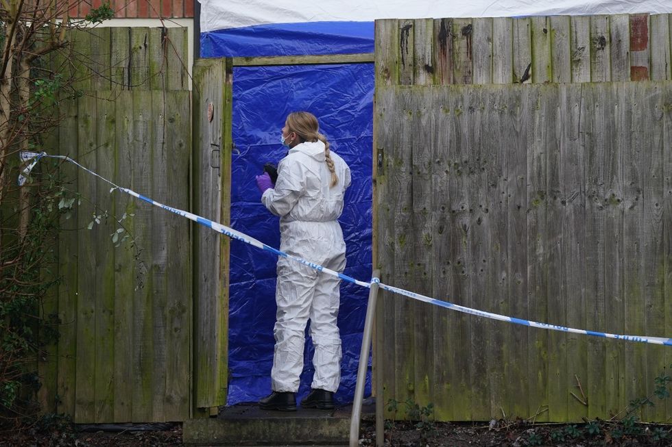 A forensic investigator at the scene on Fownhope Close in Redditch