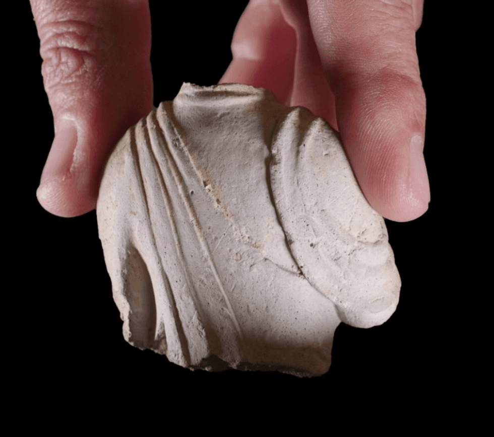 A fragment of the small statuette