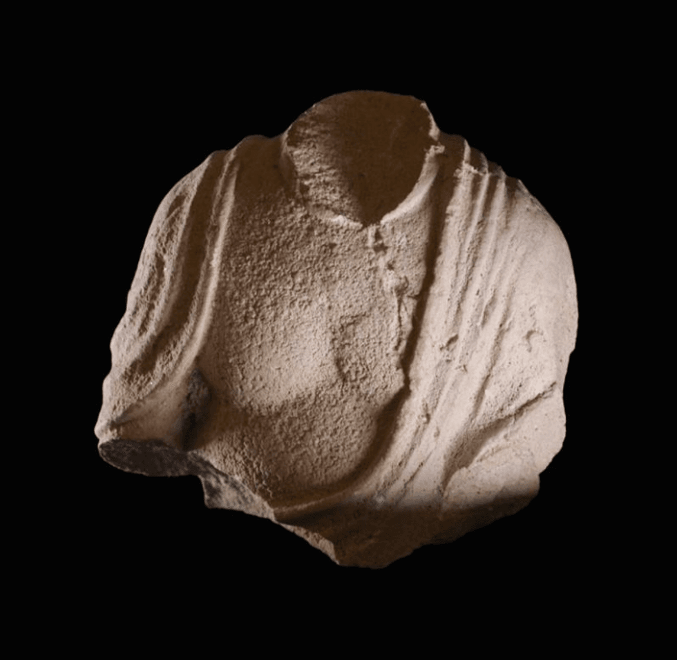 A fragment of the small statuette