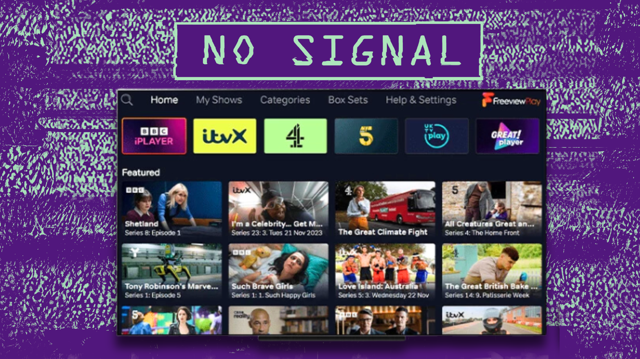 a freeview flatscreen television and tv box pictured with static in the background and a no signal warning