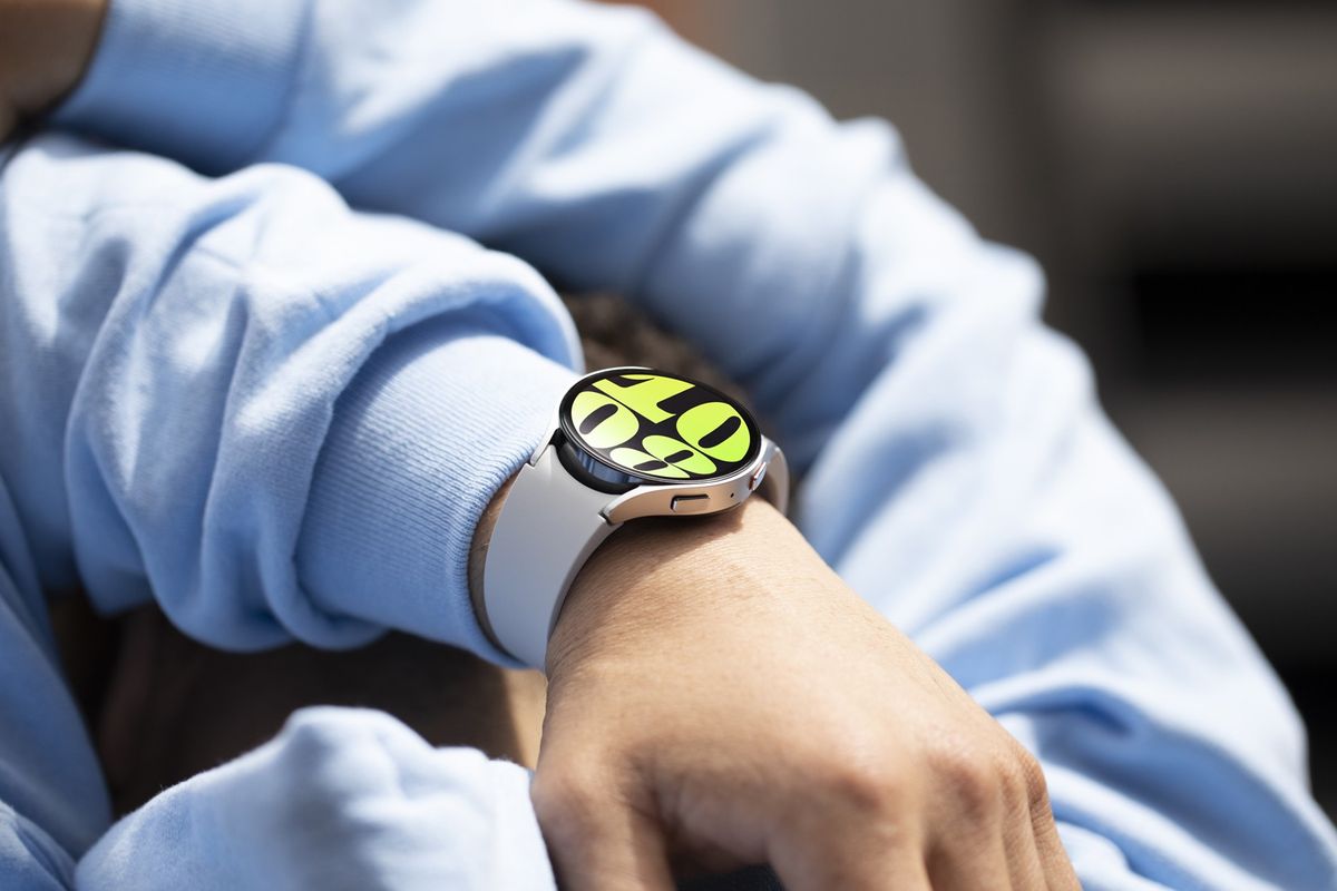 a galaxy watch6 is pictured on a mans wrist after a workout