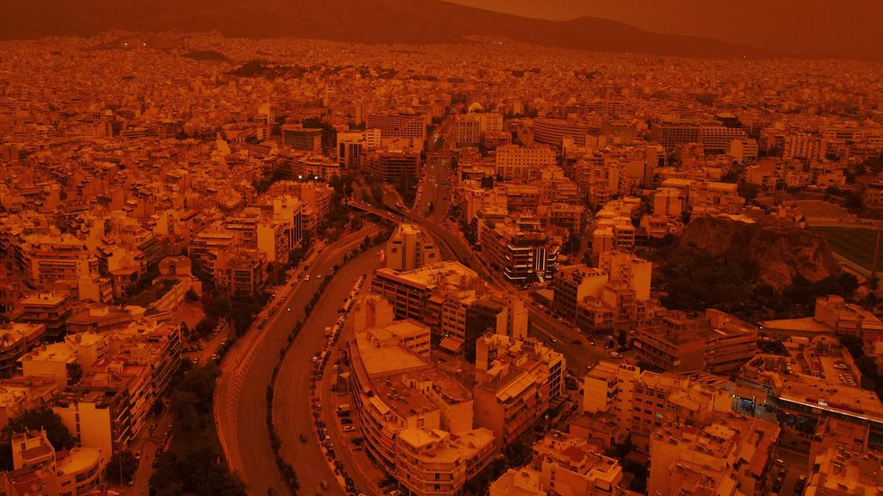 A general view as dust from the desert of Sahara covers the city of Athens