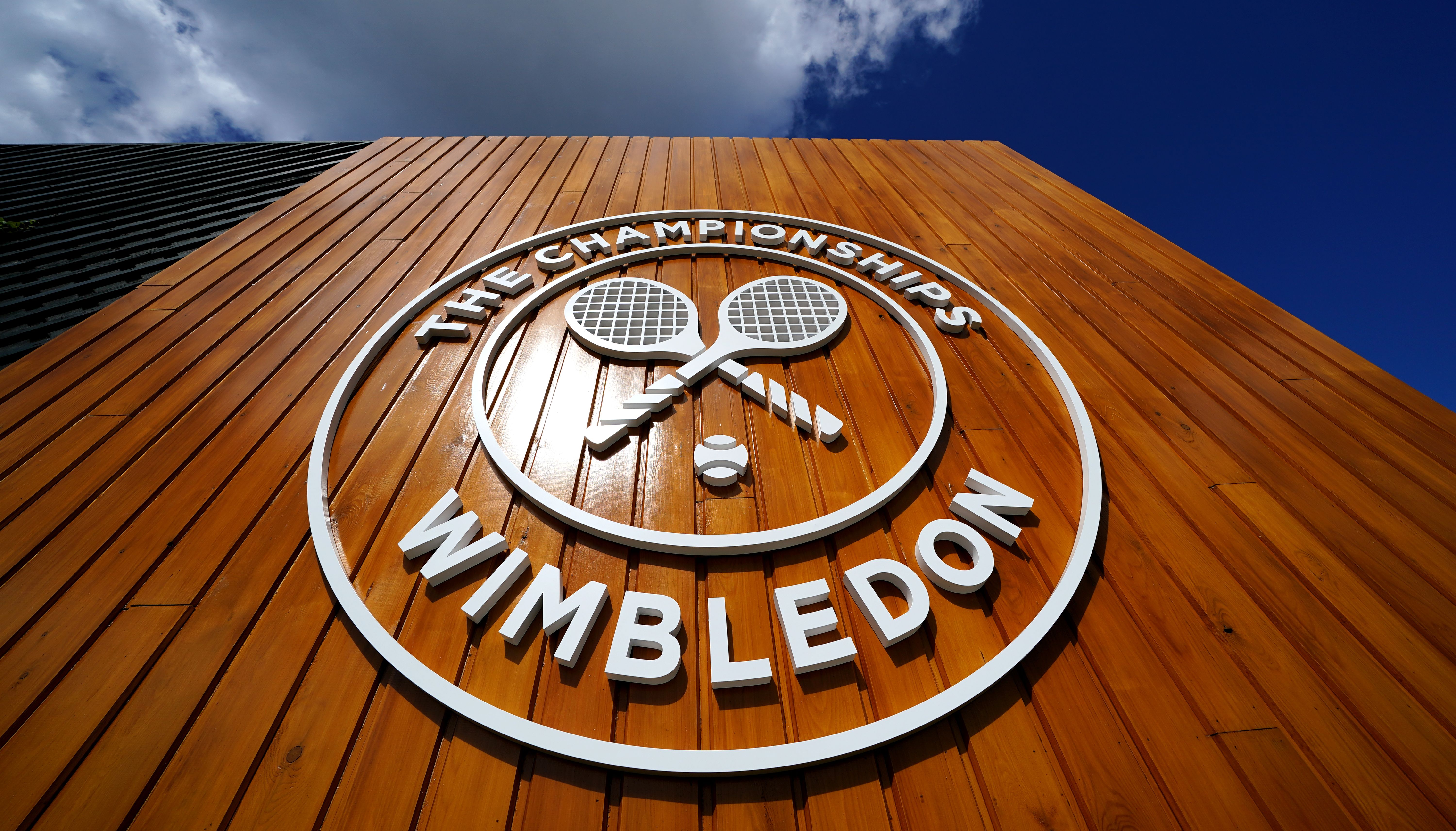 A general view of signage at the All England Lawn Tennis and Croquet Club, Wimbledon. Picture date: Sunday June 26, 2022.