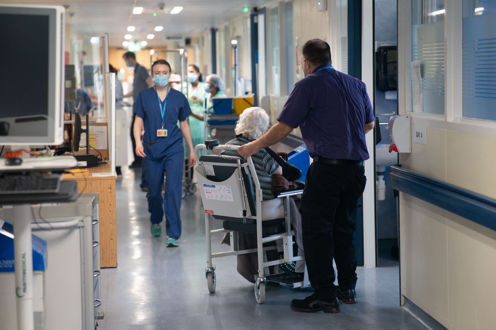 A general view of staff on a NHS hospital ward at Ealing Hospital in London