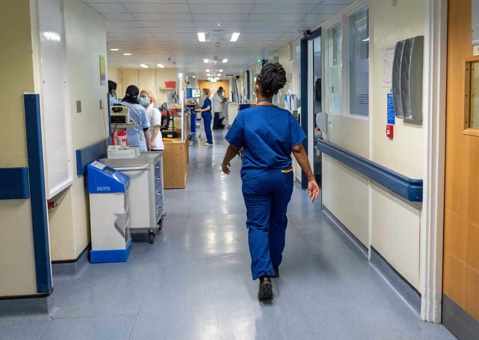 A general view of staff on a NHS hospital ward at Ealing Hospital in London