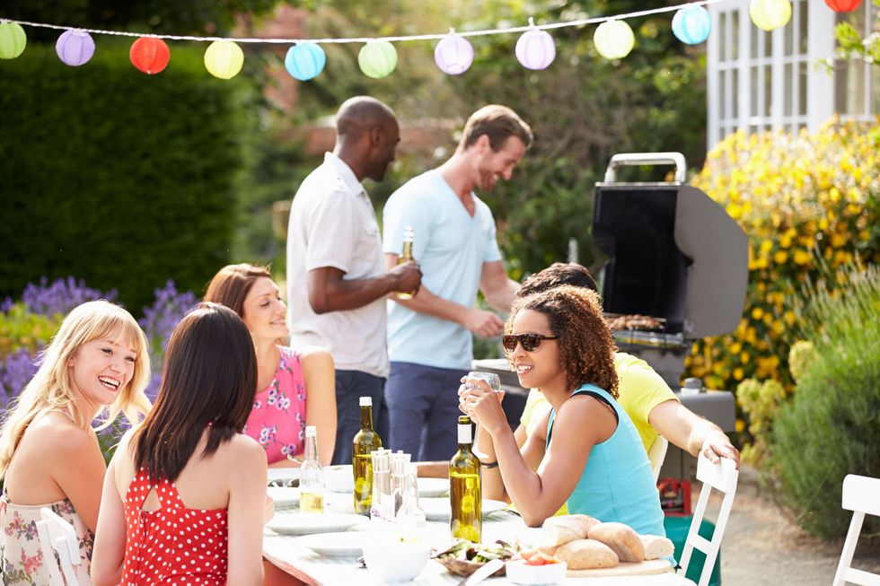 A Generic Photo of a group of friends at a barbeque in the sun. See PA Feature HEALTH Sun Protection. Picture credit should read: Alamy/PA. WARNING: This picture must only be used to accompany PA Feature HEALTH Sun Protection.