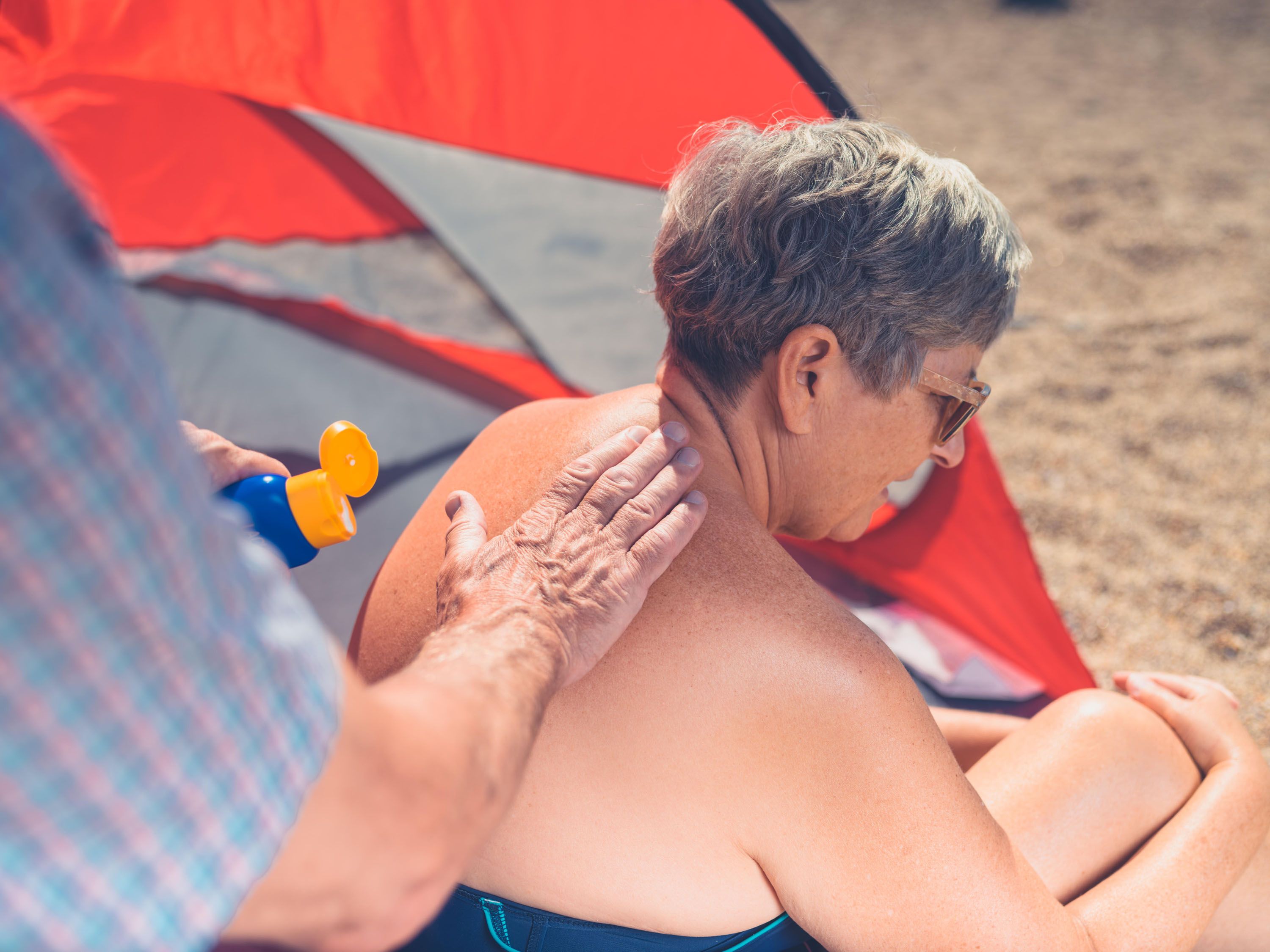 A Generic Photo of a woman on the beach having sun cream put on her back. See PA Feature HEALTH Sun Protection. Picture credit should read: Alamy/PA. WARNING: This picture must only be used to accompany PA Feature HEALTH Sun Protection.