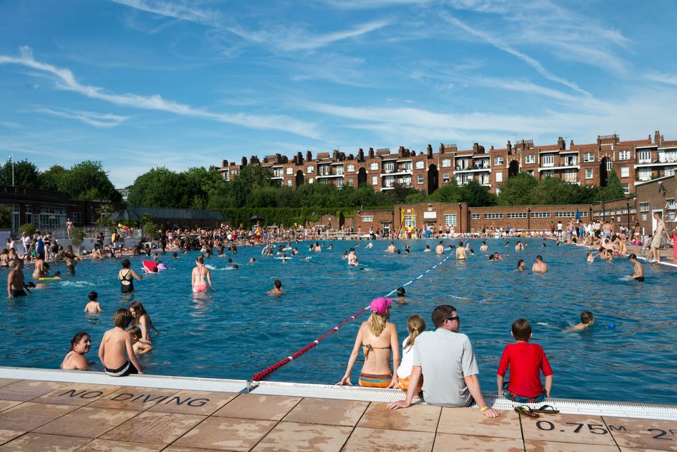 A Generic Photo of people swimming in the sun at a London lido. See PA Feature HEALTH Sun Protection. Picture credit should read: Alamy/PA. WARNING: This picture must only be used to accompany PA Feature HEALTH Sun Protection.