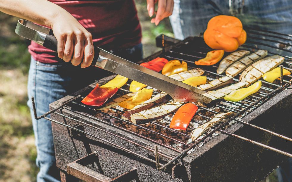 A Generic Photo of someone cooking vegetables on a BBQ. See PA Feature FOOD BBQ. Picture credit should read: Alamy/PA. WARNING: This picture must only be used to accompany PA Feature FOOD BBQ.