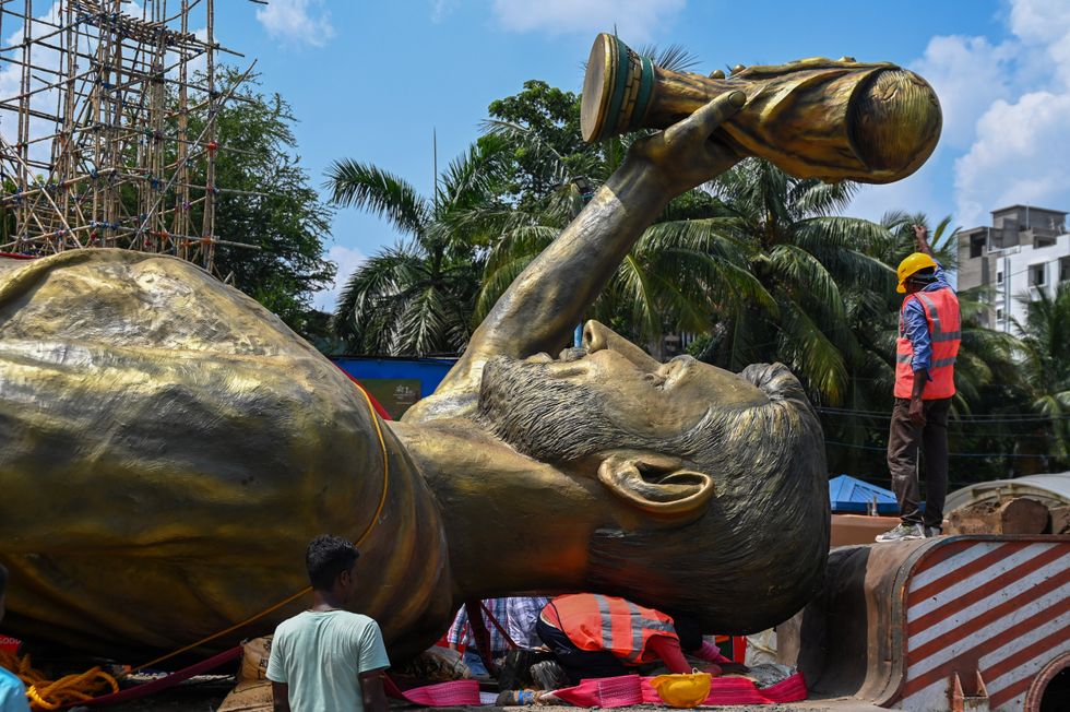 A giant statue of Lionel Messi has been taken down after officials reportedly discovered the structure was moving in strong winds, prompting concerns over public safety