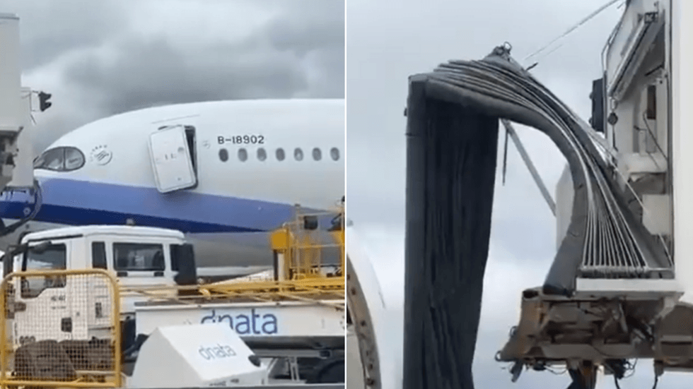 A grounded plane has smashed a door into an aerobridge after it rolled backwards while on the runway