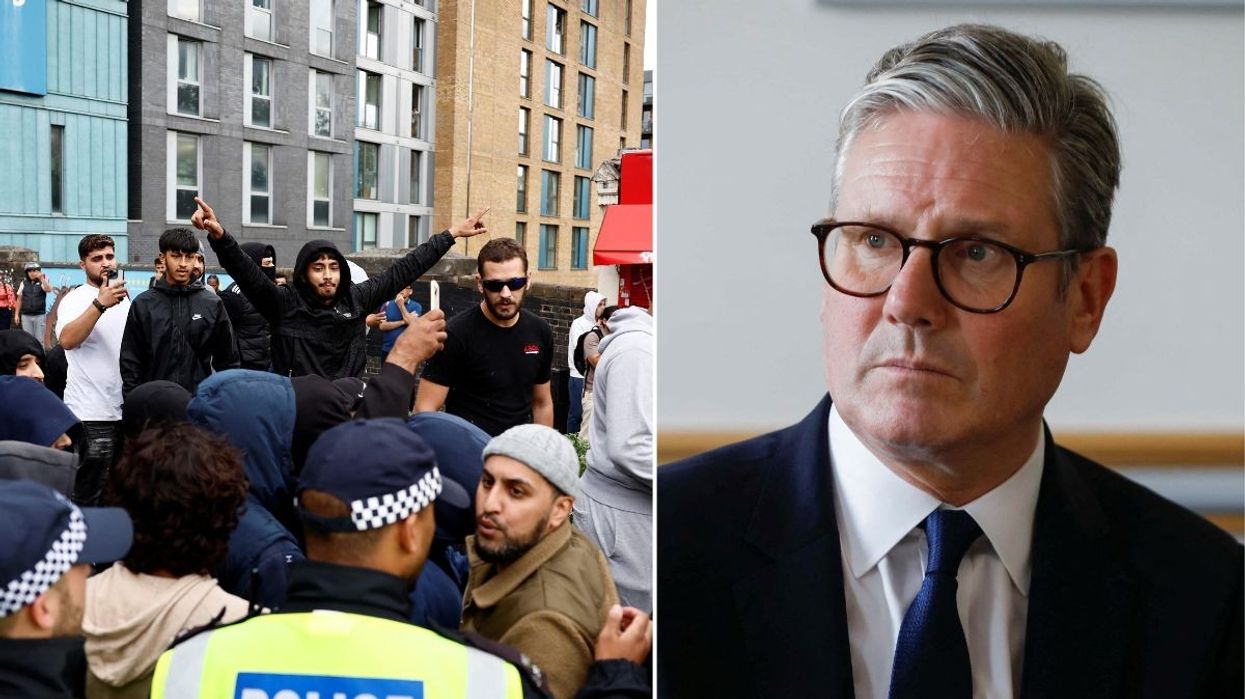 A group of counter-protestors and Keir Starmer