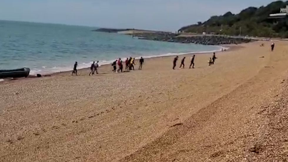 A group of migrants arrive in Folkestone.