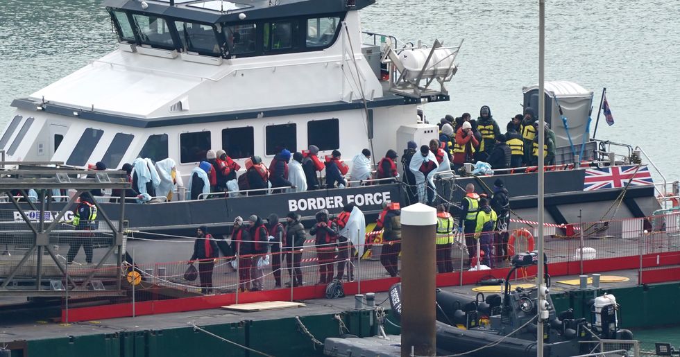 A group of people believed to be migrants brought in to Dover by Border Force