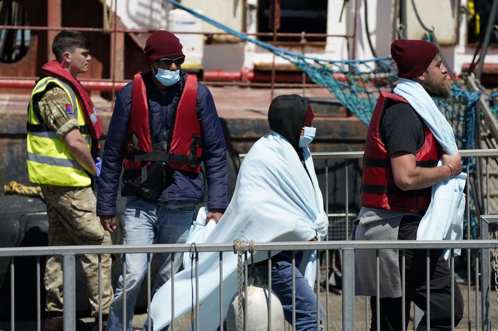A group of people thought to be migrants are brought in to Dover, Kent, by Border Force, following a small boat incident in the Channel