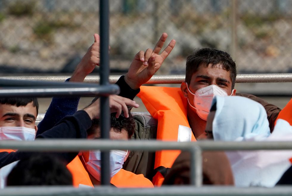 A group of people thought to be migrants are brought in to Dover, Kent, by Border Force, following a small boat incident in the Channel. Picture date: Friday September 10, 2021.