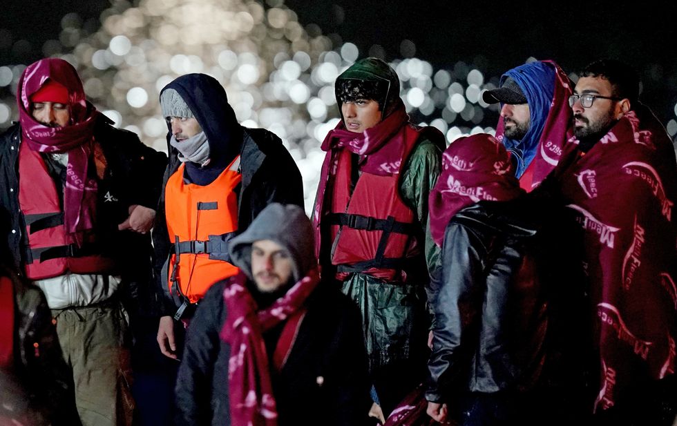 A group of people thought to be migrants are brought in to Dover, Kent, following a small boat incident in the Channel after 27 people died yesterday in the worst-recorded migrant tragedy in the Channel.