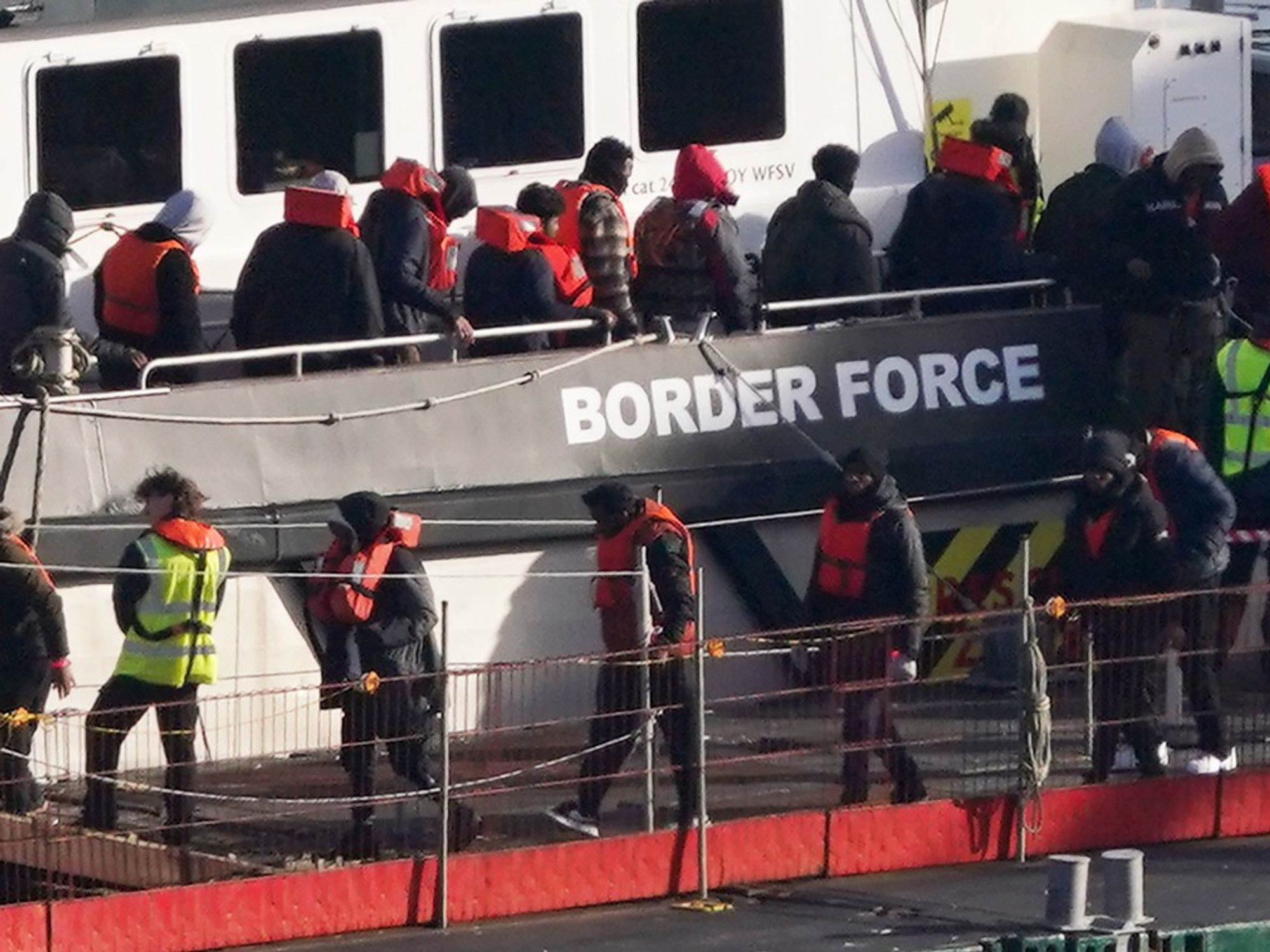 A group of people thought to be migrants are brought in to Dover, Kent, from a Border Force vessel