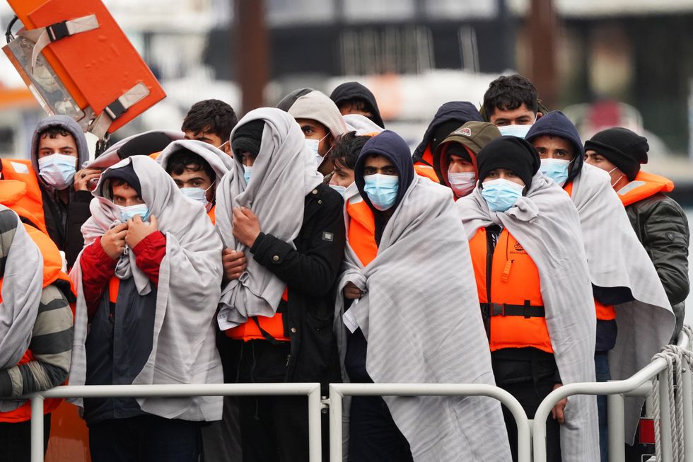 A group of people thought to be migrants are brought in to Dover, Kent, on board the Dover lifeboat, following a small boat incident in the Channel.