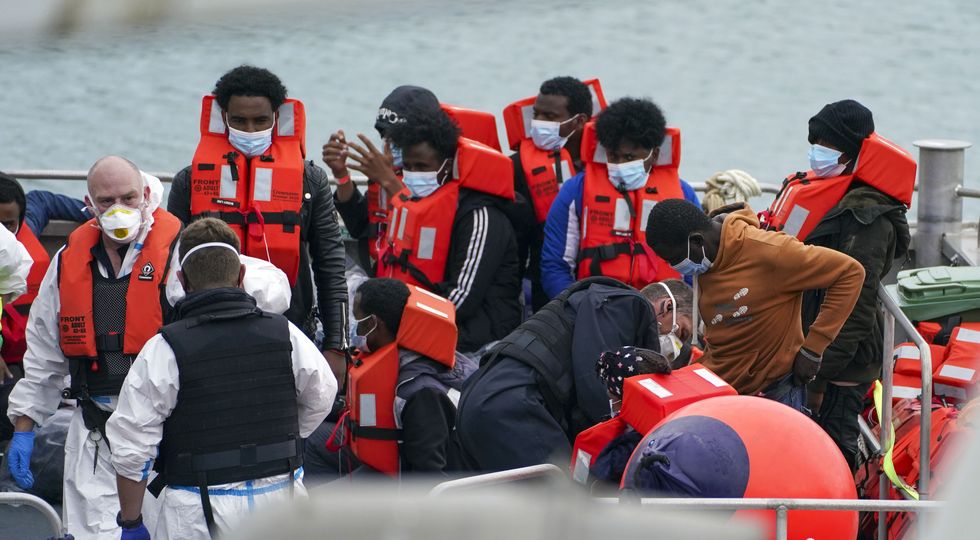 A group of people thought to be migrants are brought in to Dover, Kent, onboard a Border Force vessel, following a small boat incident in the Channel.