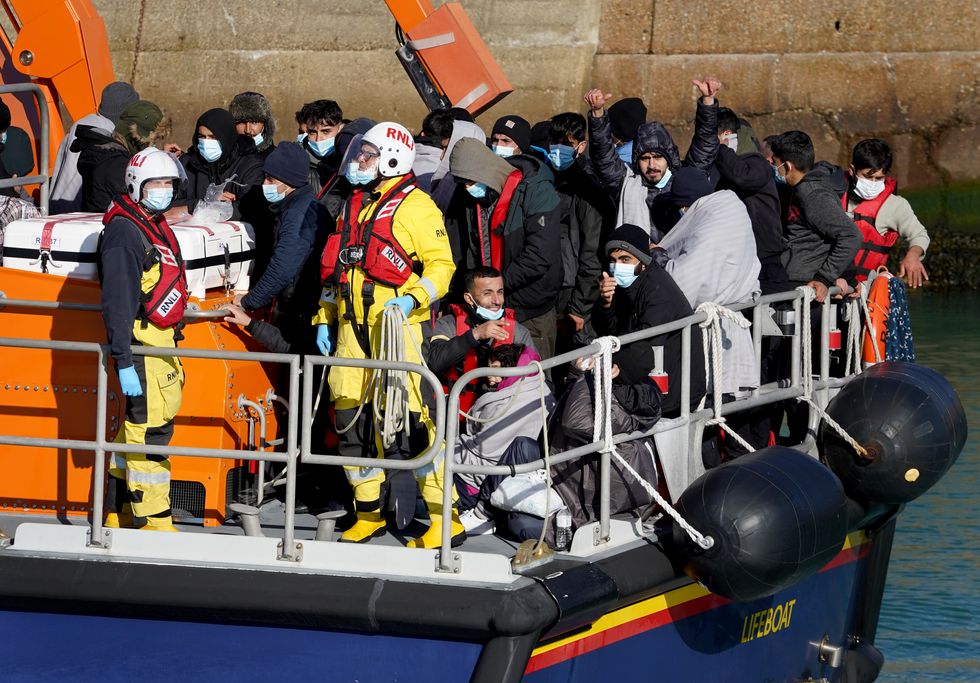 A group of people thought to be migrants are brought in to Dover, Kent, onboard the Dover Lifeboat following a small boat incident in the Channel. Picture date: Tuesday November 2, 2021.