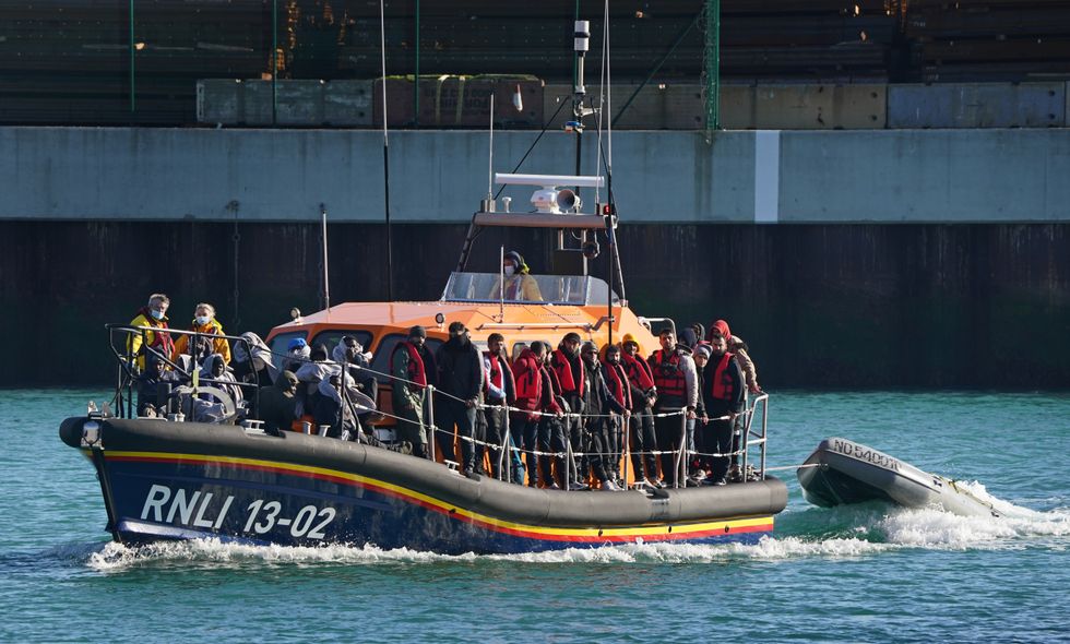 A group of people thought to be migrants are brought in to Dover, Kent, onboard the Dungeness Lifeboat following a small boat incident in the Channel.