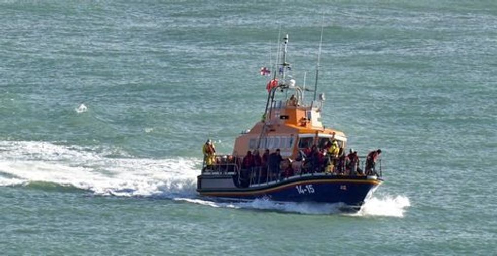A group of people thought to be migrants are brought in to Dover, Kent, onboard the Ramsgate Lifeboat following a small boat incident in the Channel. Picture date: Thursday October 27, 2022.