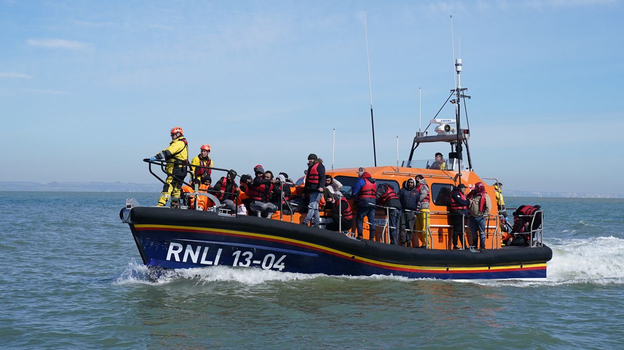 A group of people thought to be migrants are brought in to Dungeness, Kent