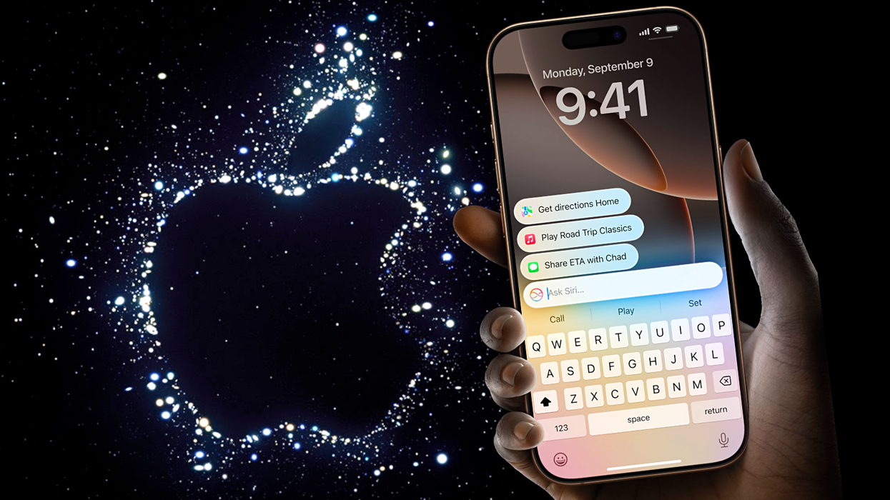 a hand holds an iphone 16 pro max with an apple logo pictured in the background