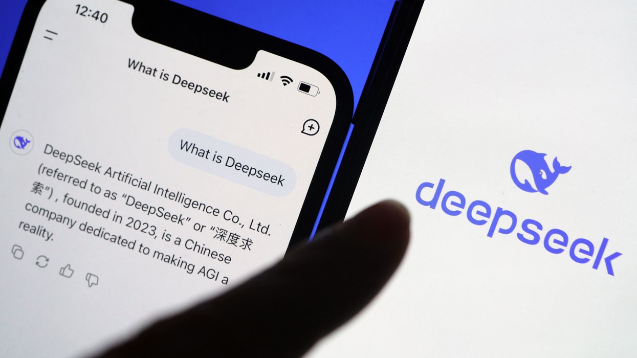 a hand taps on the deepseek icon on iphone and uses the ai chatbot