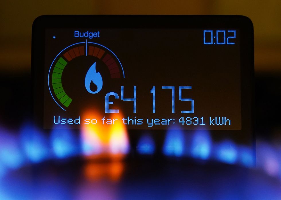 A handheld smart meter on a kitchen hob showing the cost of a year-to-date's worth of home energy usage in a home in Dorset. Picture date: Sunday April 24, 2022.
