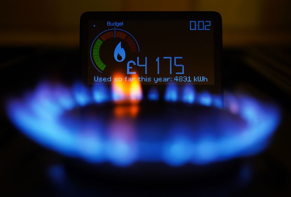 A handheld smart meter on a kitchen hob showing the cost of a year-to-date's worth of home energy usage in a home in Dorset. Picture date: Sunday April 24, 2022.