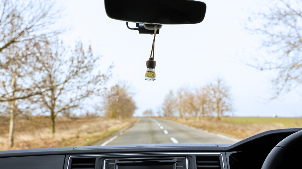 A hanging air freshener in a car