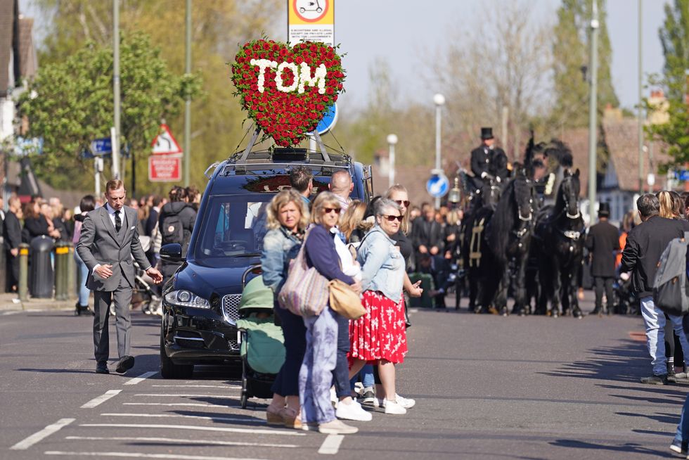 A hearse ahead of the funeral of The Wanted star Tom Parker in Queensway, Petts Wood, in south-east London, following his death at the age of 33 last month, 17 months after being diagnosed with an inoperable brain tumour. Picture date: Wednesday April 20, 2022.