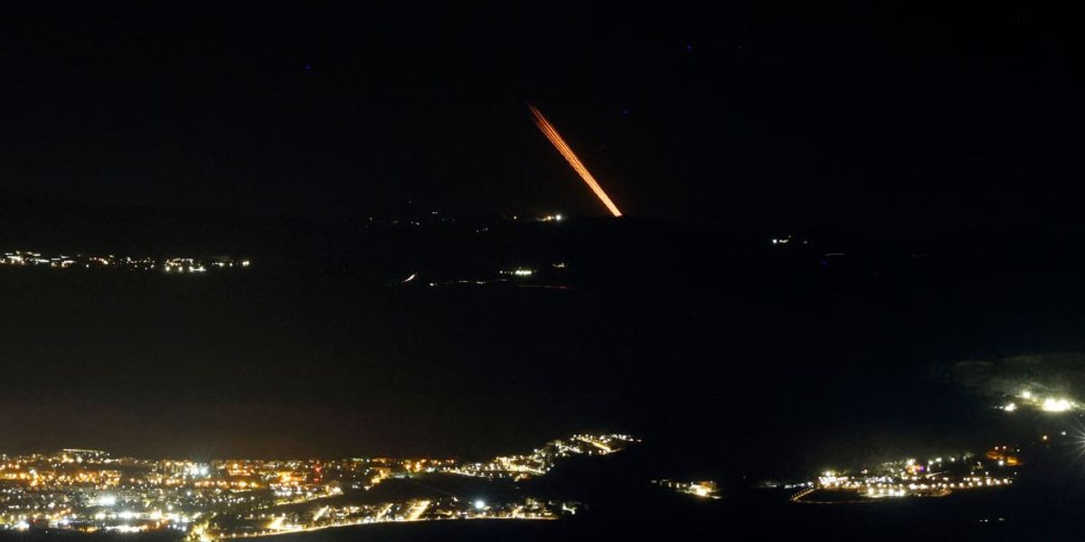 NextImg:Hezbollah rocket strikes Israel's main airport as group launches 120-missile barrage across border