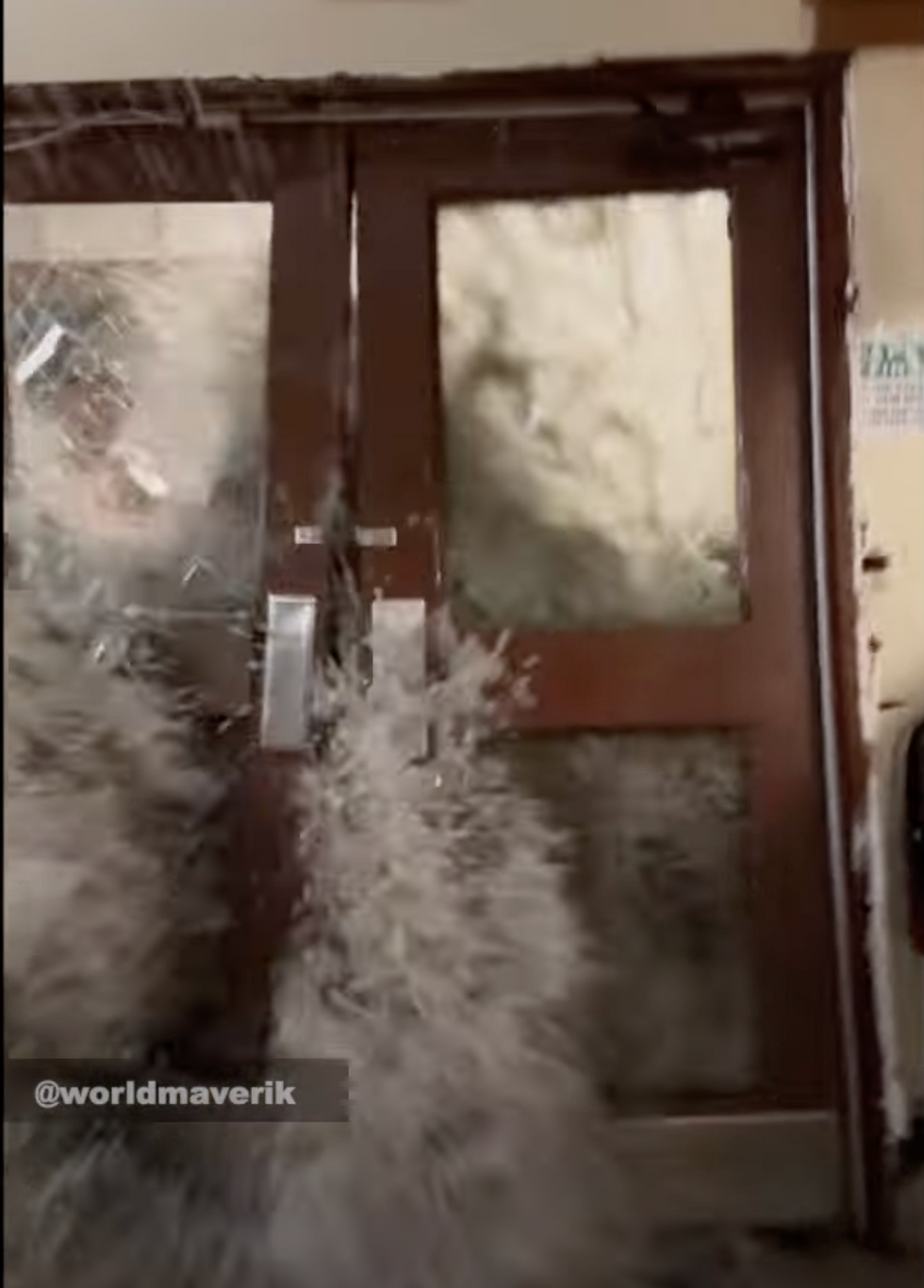 A huge freak wave smashed down a door at a US army camp