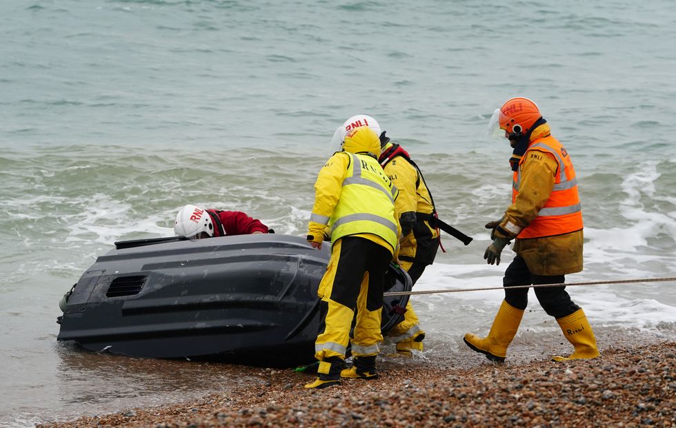 A jet ski thought to have been used in a migrant crossing is brought in to Dungeness, Kent, by the RNLI after being intercepted in the Channel. Picture date: Monday November 15, 2021.