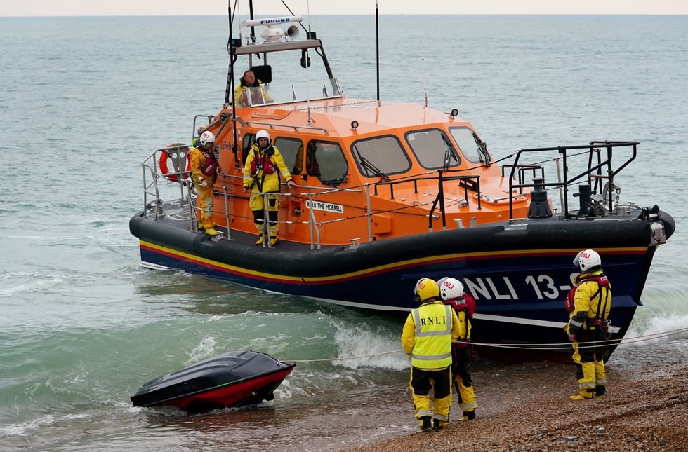 A jet ski thought to have been used in a migrant crossing is brought in to Dungeness, Kent