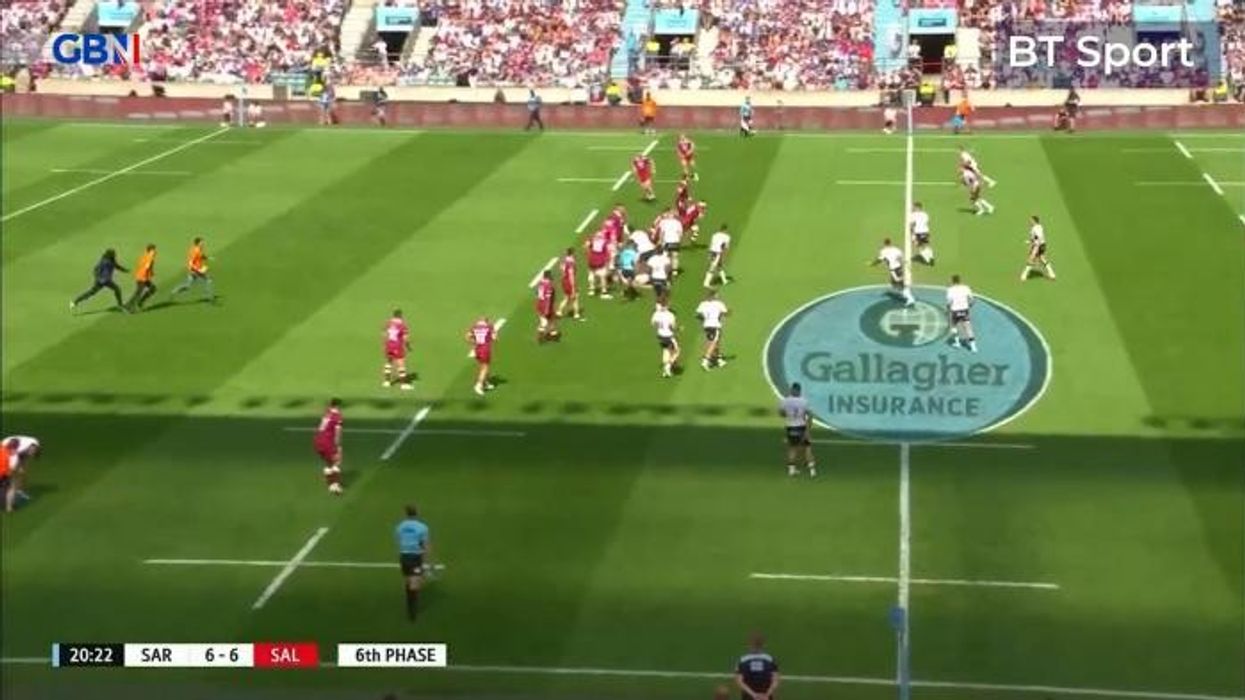 Just Stop Oil protestor WRECKS rugby Premiership final by invading pitch with orange smoke bomb